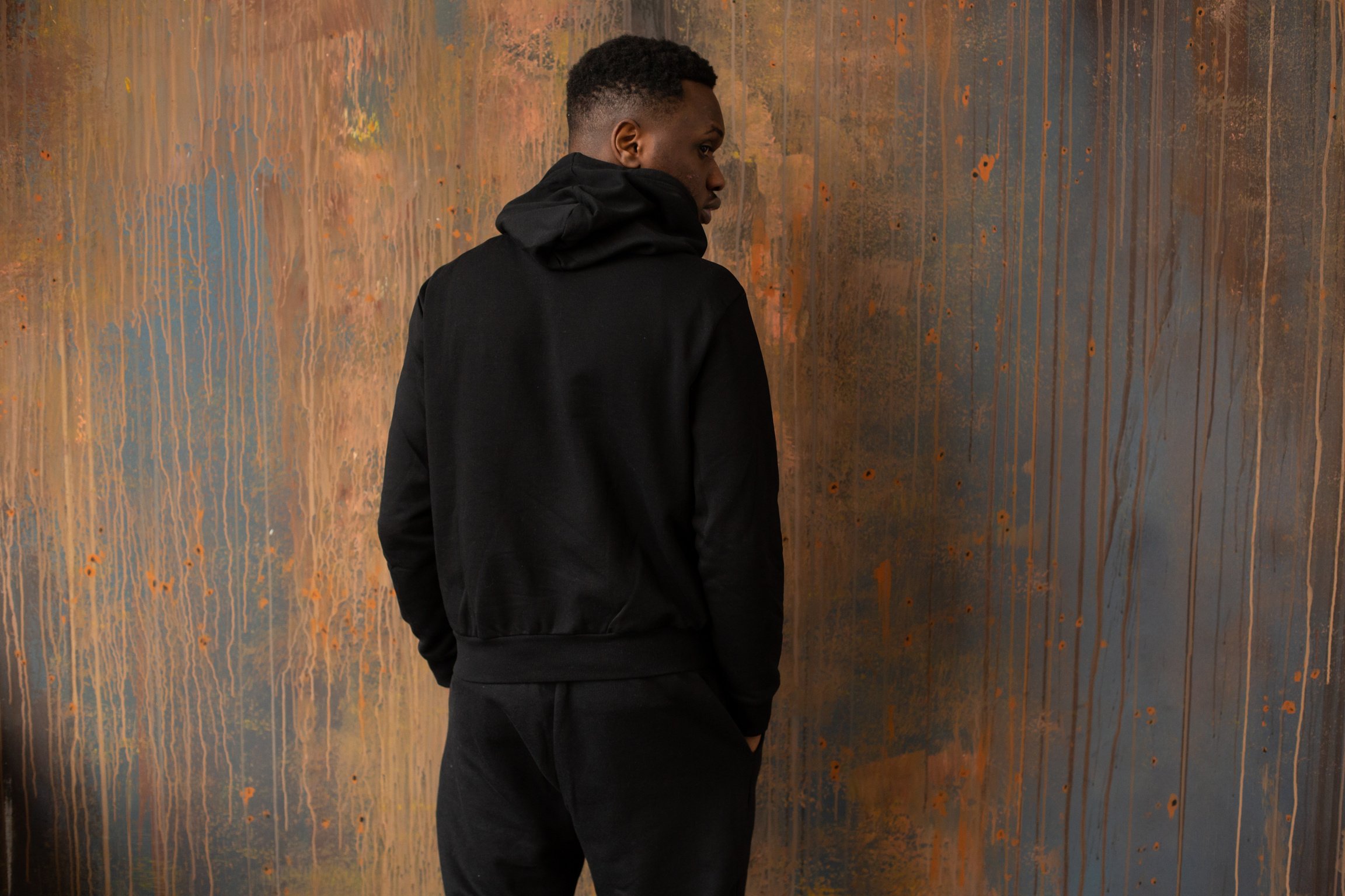 Faceless black man in hoodie